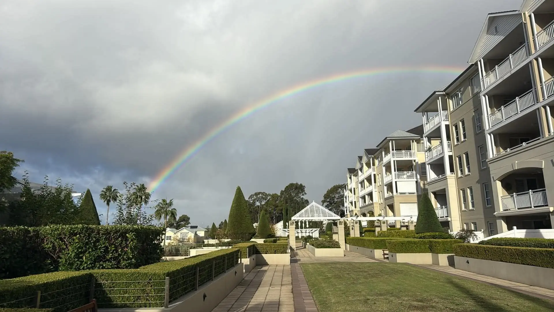 Strata garden maintenance Sydney — clipped hedges and lawns at an apartment complex maintained by Greater Sydney Landscapes